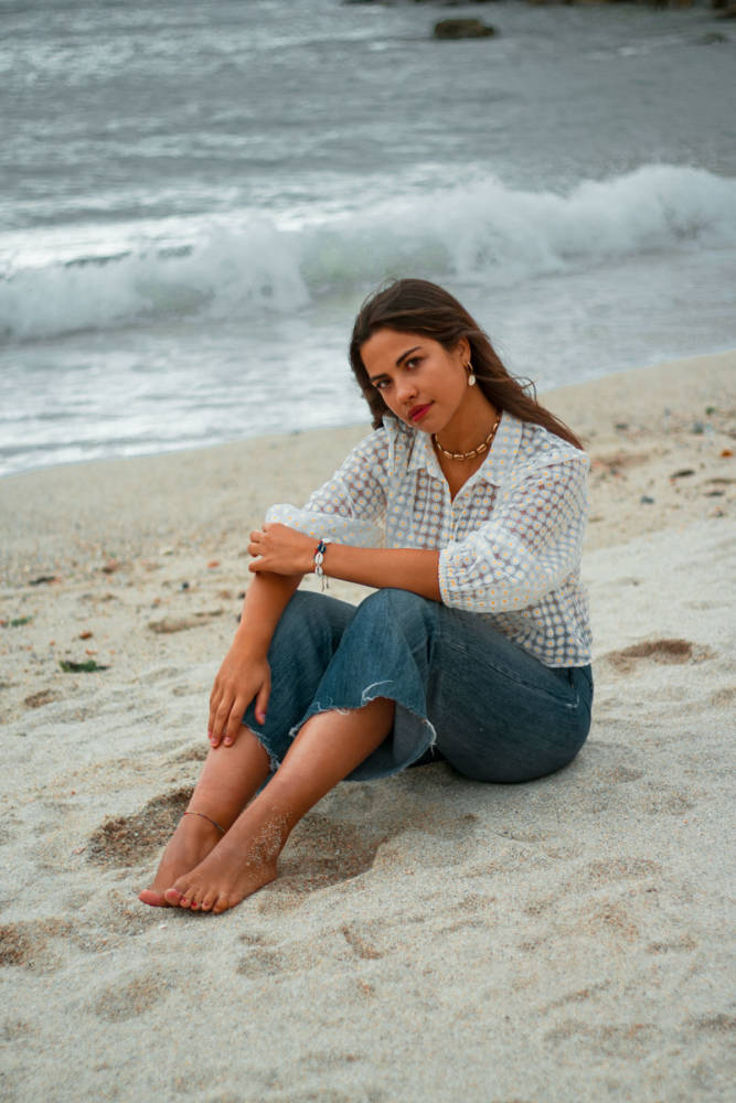 Elena- Girl at the beach wearing jeans- Martina Lubian - Fashion Photography